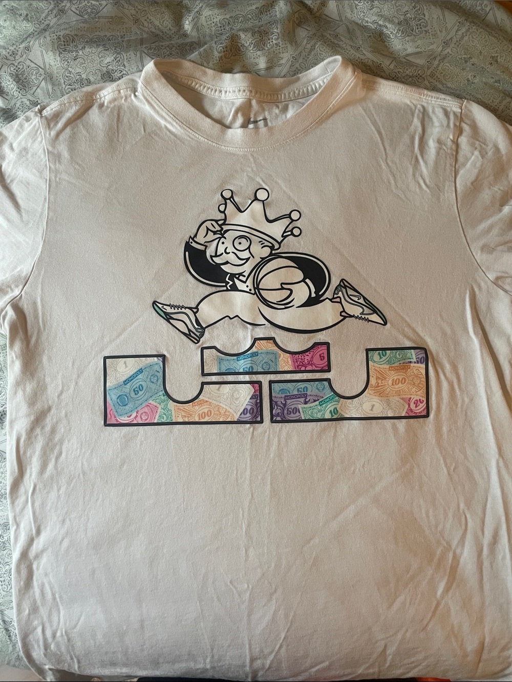 Nike Mens White Tee with Crowned Character and Multicolor Money Logo